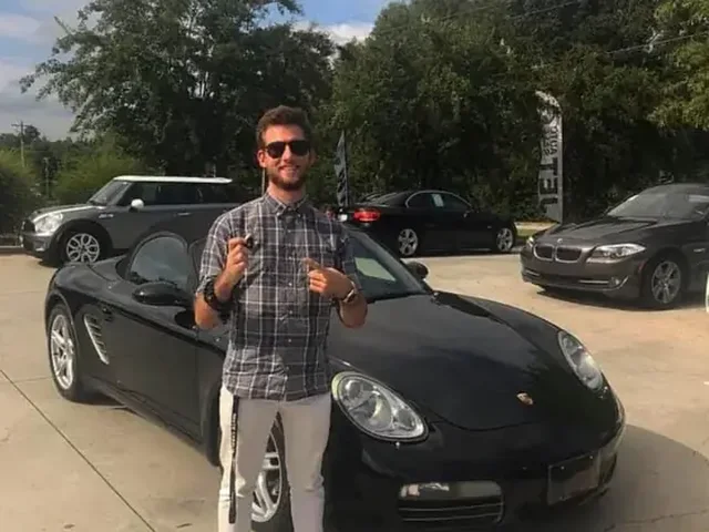 Past student with his Porsche
